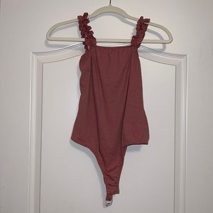 Pink bodysuit